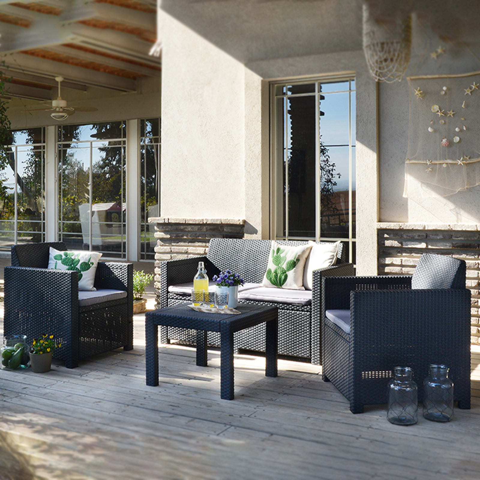 Salon de jardin "Alabama" en résine rotin, table basse + canapé + 2 fauteuils avec coussins