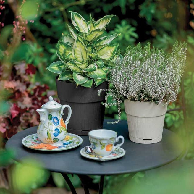 Vaso tondo infrangibile Ethica in plastica riciclata con riserva acqua