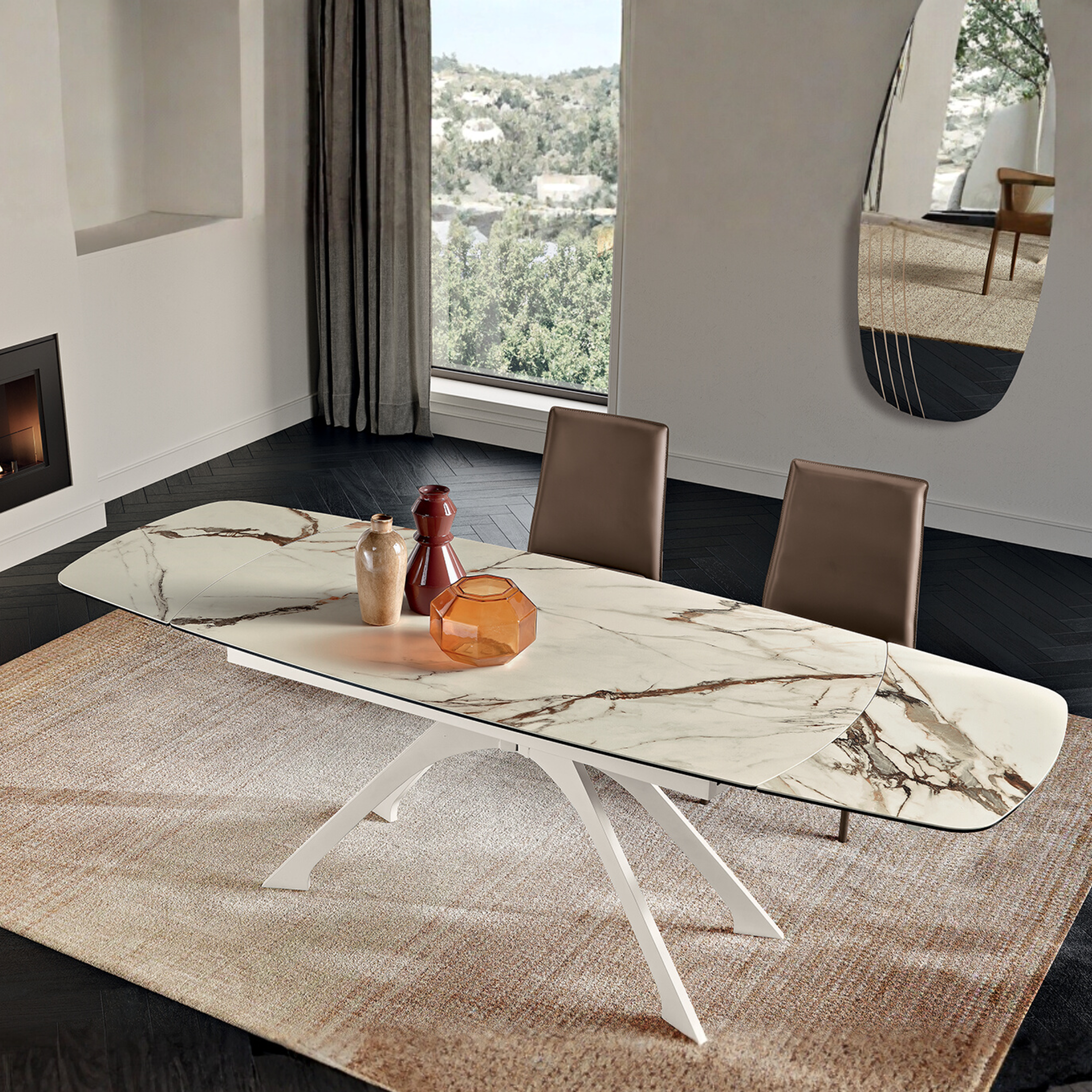 Tavolo allungabile "Nido" con piano in grès porcellanato effetto marmo cm 160/240x90 77h