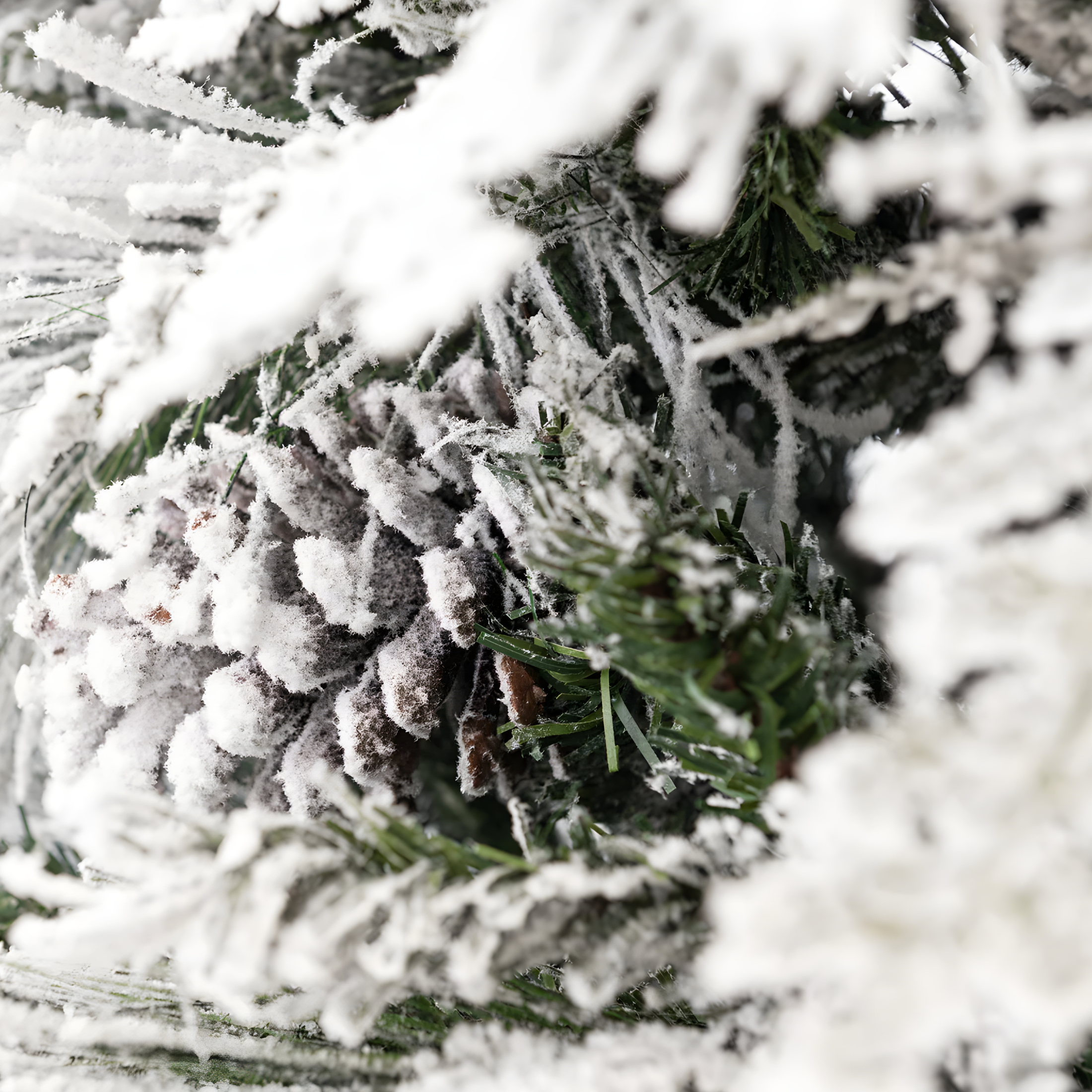 Albero di Natale innevato con pigne "Nevischio" in PE effetto Real Touch + PP cm 240h