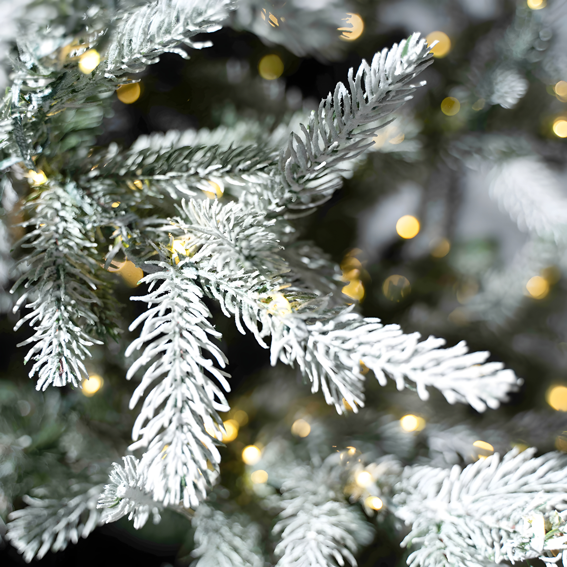 Albero di Natale innevato "Sistem flok" con micro led in PE effetto Real Touch + PVC + Flock